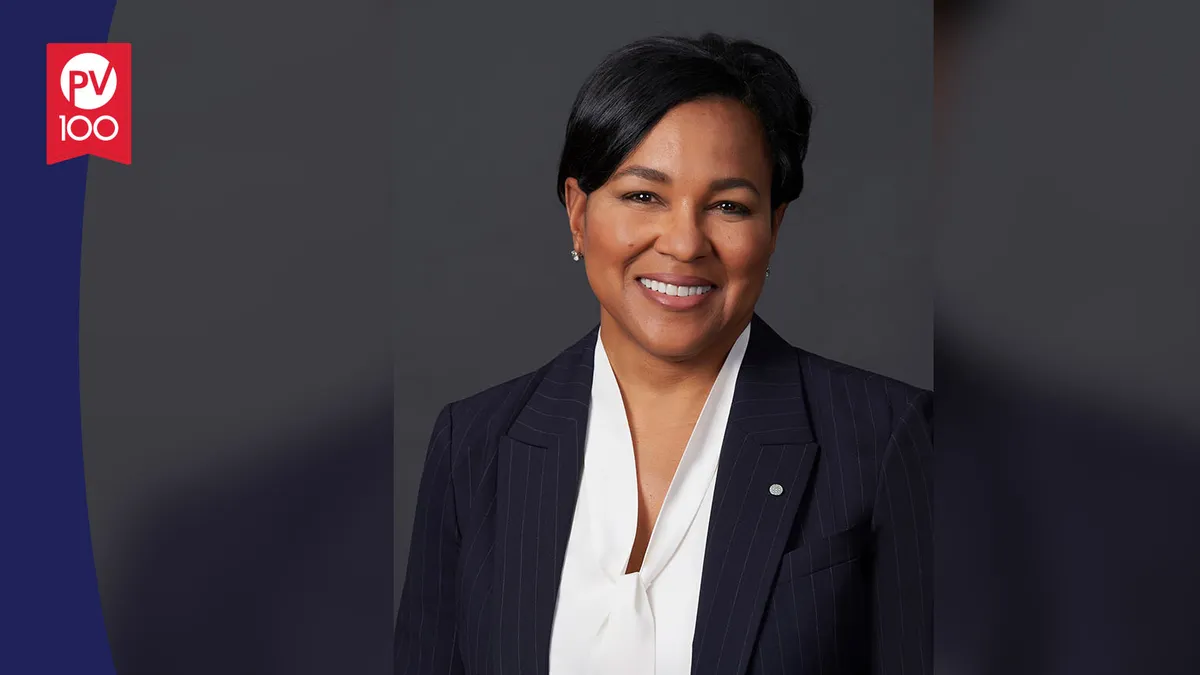 A portrait of Rosalind Brewer framed with a banner icon that reads "PV 100"