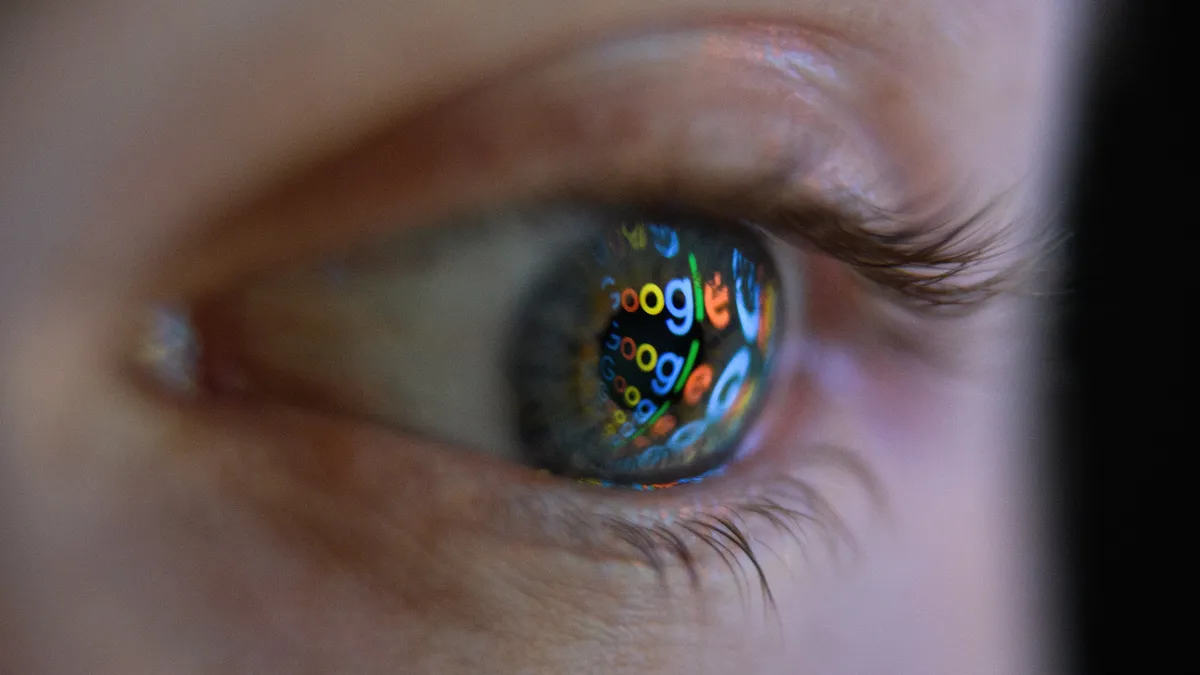 Google logo reflection in an eye