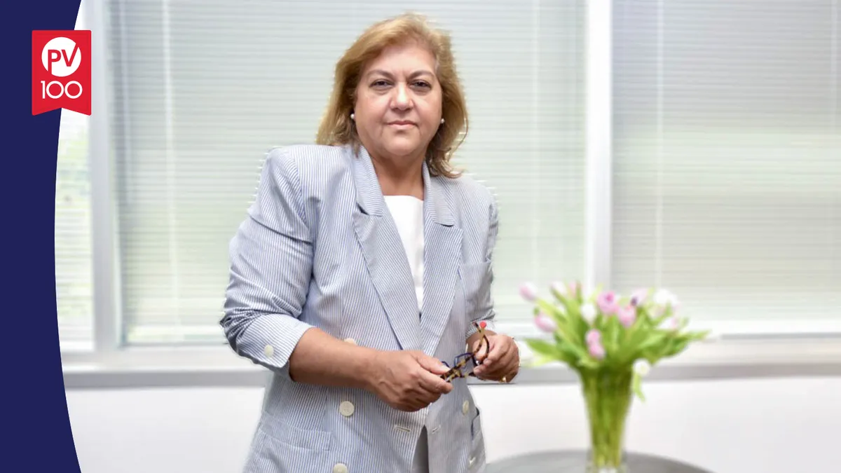 A portrait of Helen Sabzevari framed with a banner icon that reads "PV 100"